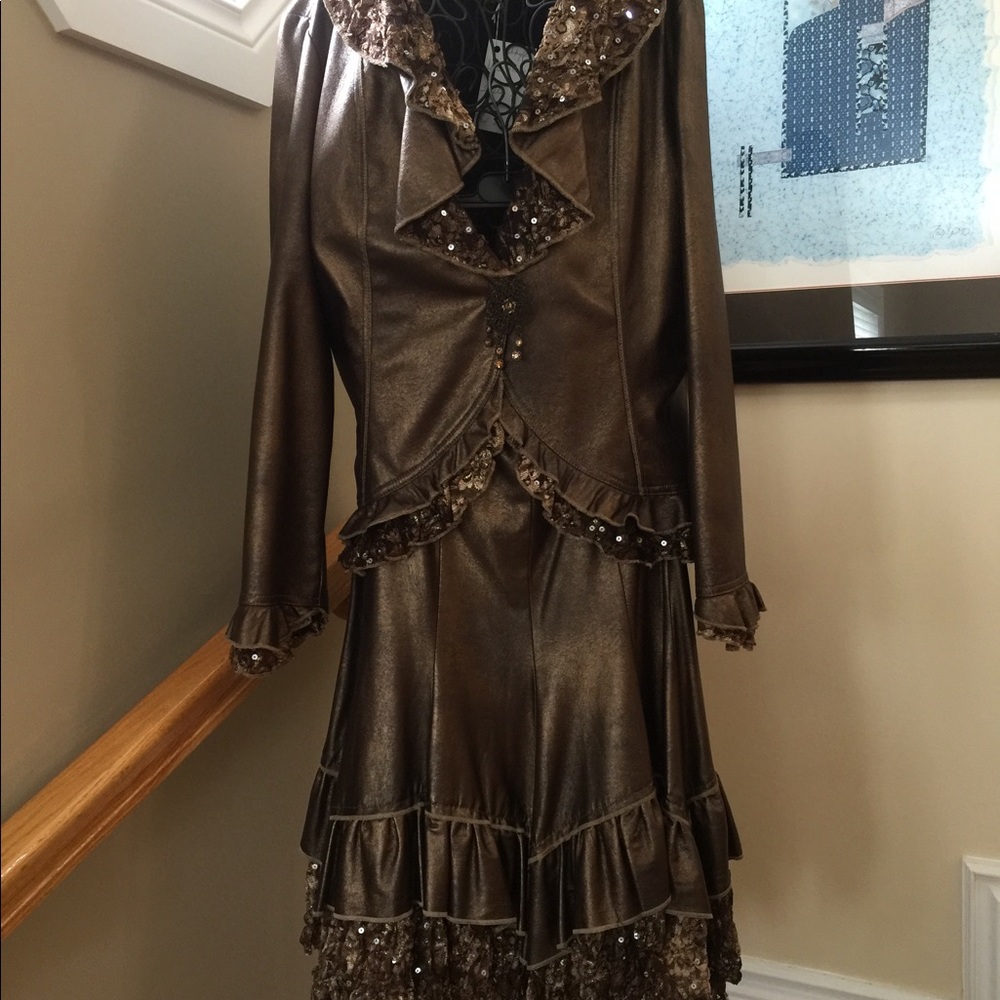 Faux leather, copper colour with gold sequins. 4 piece suit.